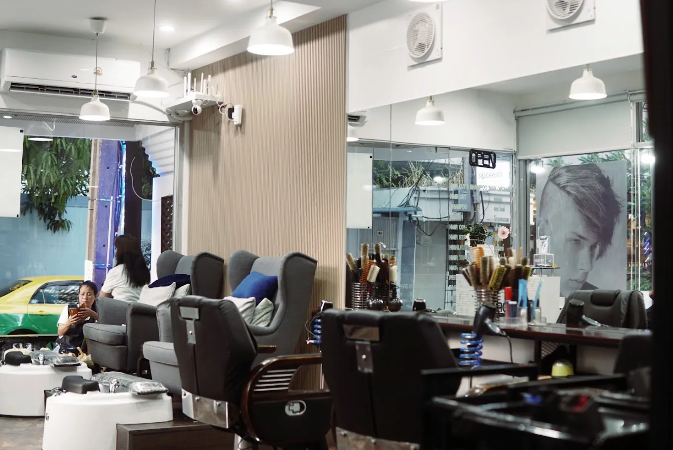 Barber chairs, styling stations and pedicure chairs inside Metamorphosis