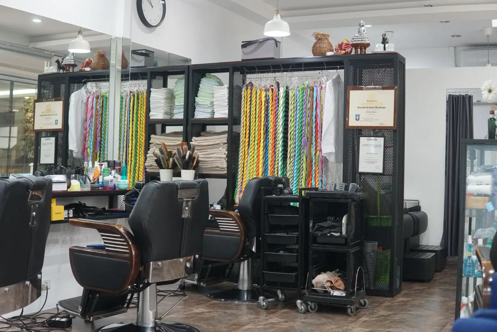 Barber chairs and styling stations inside the salon